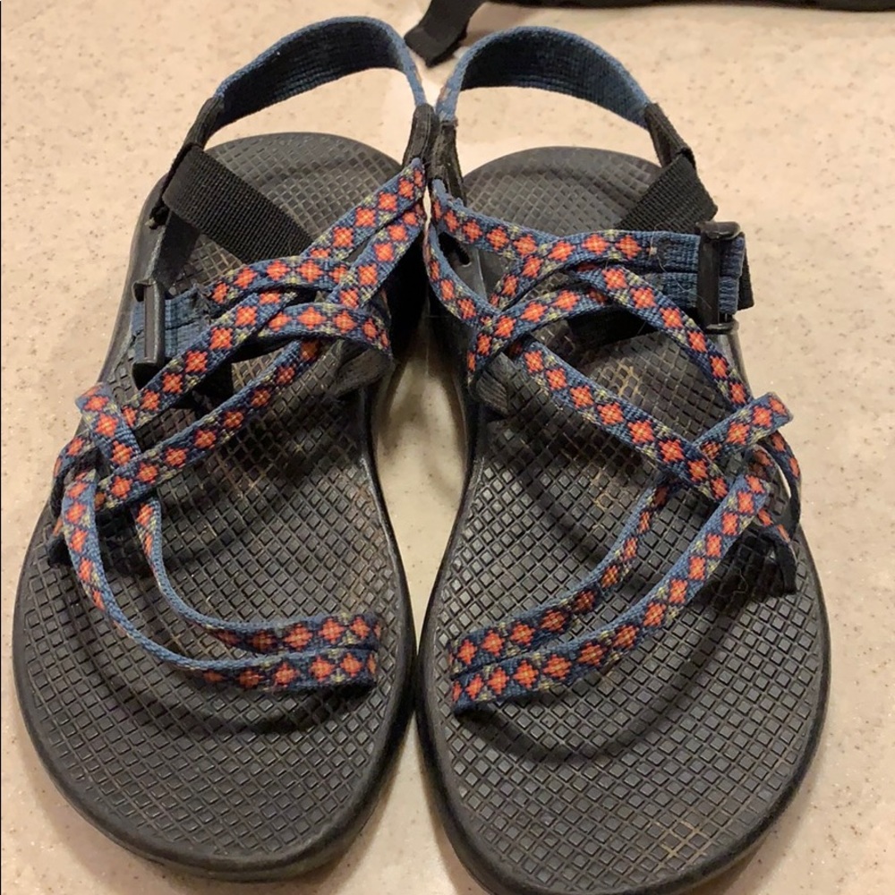 red and blue patterned chacos.